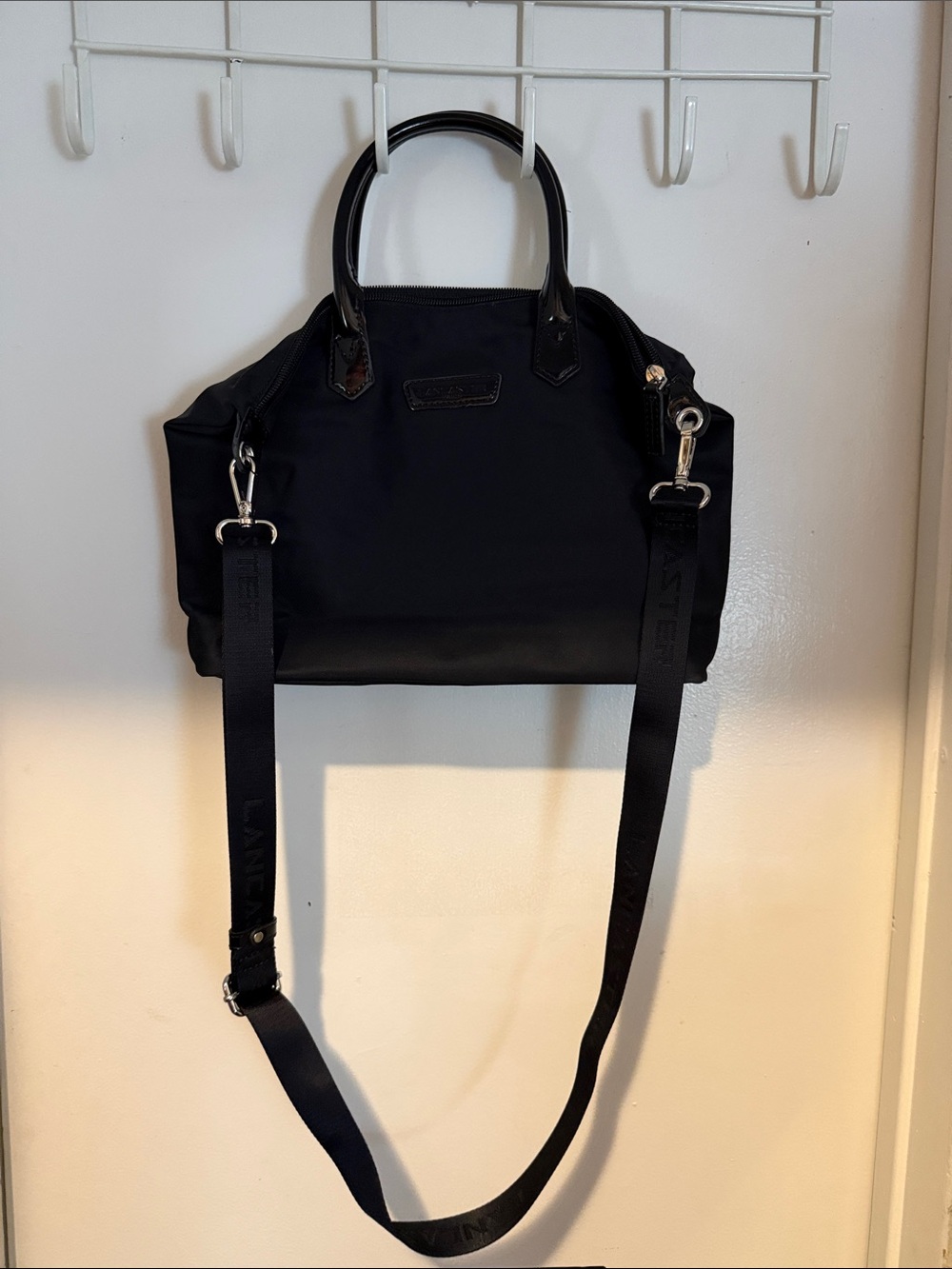 Lancaster Paris Black Nylon Bag with Patent Logo Plaque